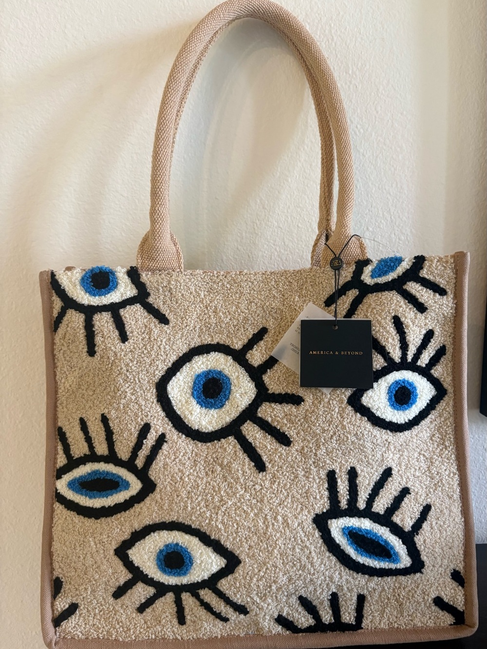 America & Beyond Beige Tote with Blue Eye Motif